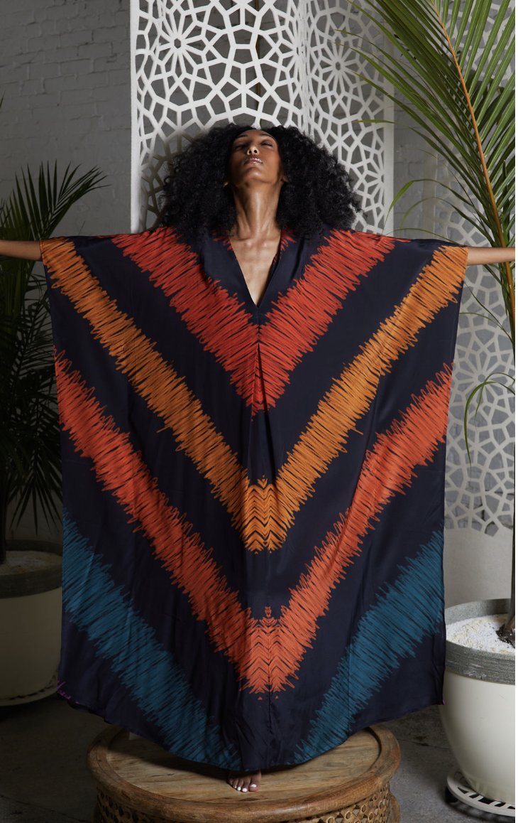 women posed in beautiful silk multi colored caftan 